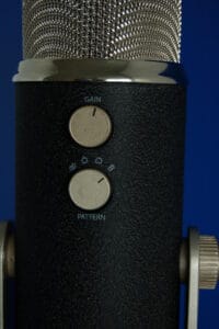 The settings knobs on the back of the Yeti microphone by Blue. The top knob is labeled "gain"