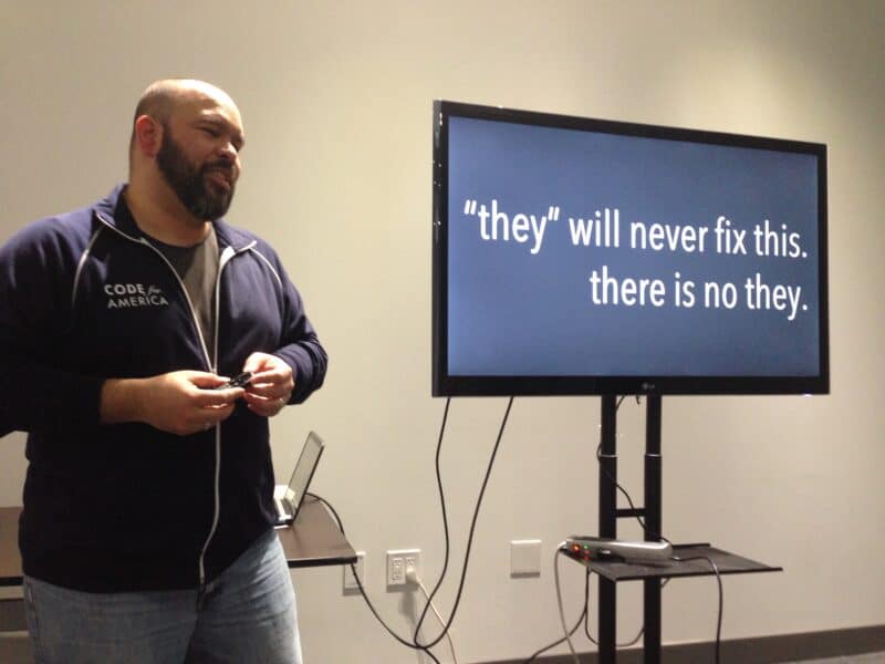 Carlos Moreno presents a slide saying, "They will never fix this. There is no they."