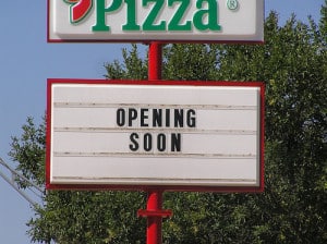 Sign says, "Opening Soon"